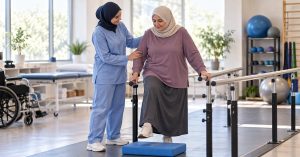 Clinician checking balance in a patient with peripheral neuropathy